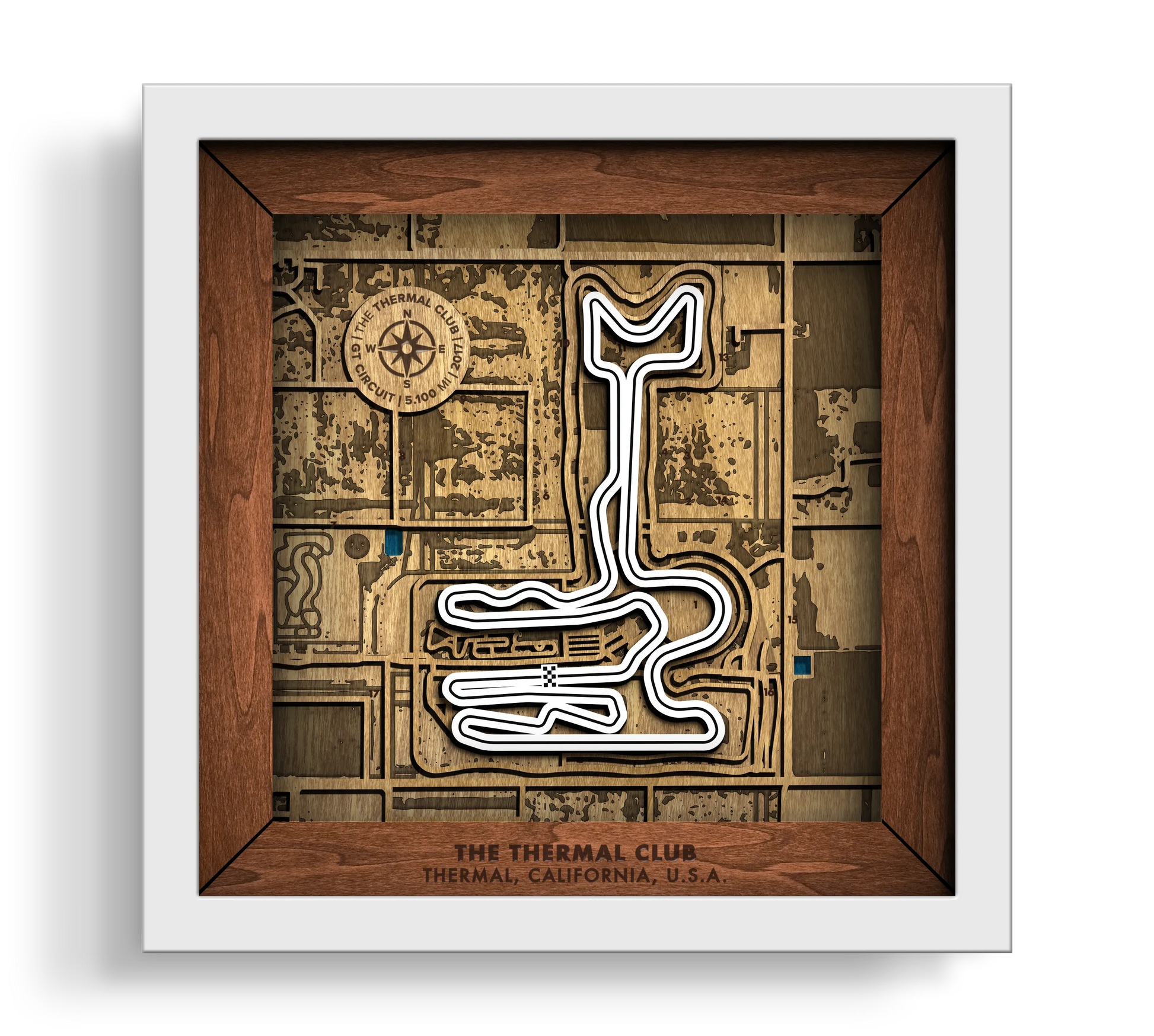 Handcrafted Thermal Club layered wooden wall art in a white frame.