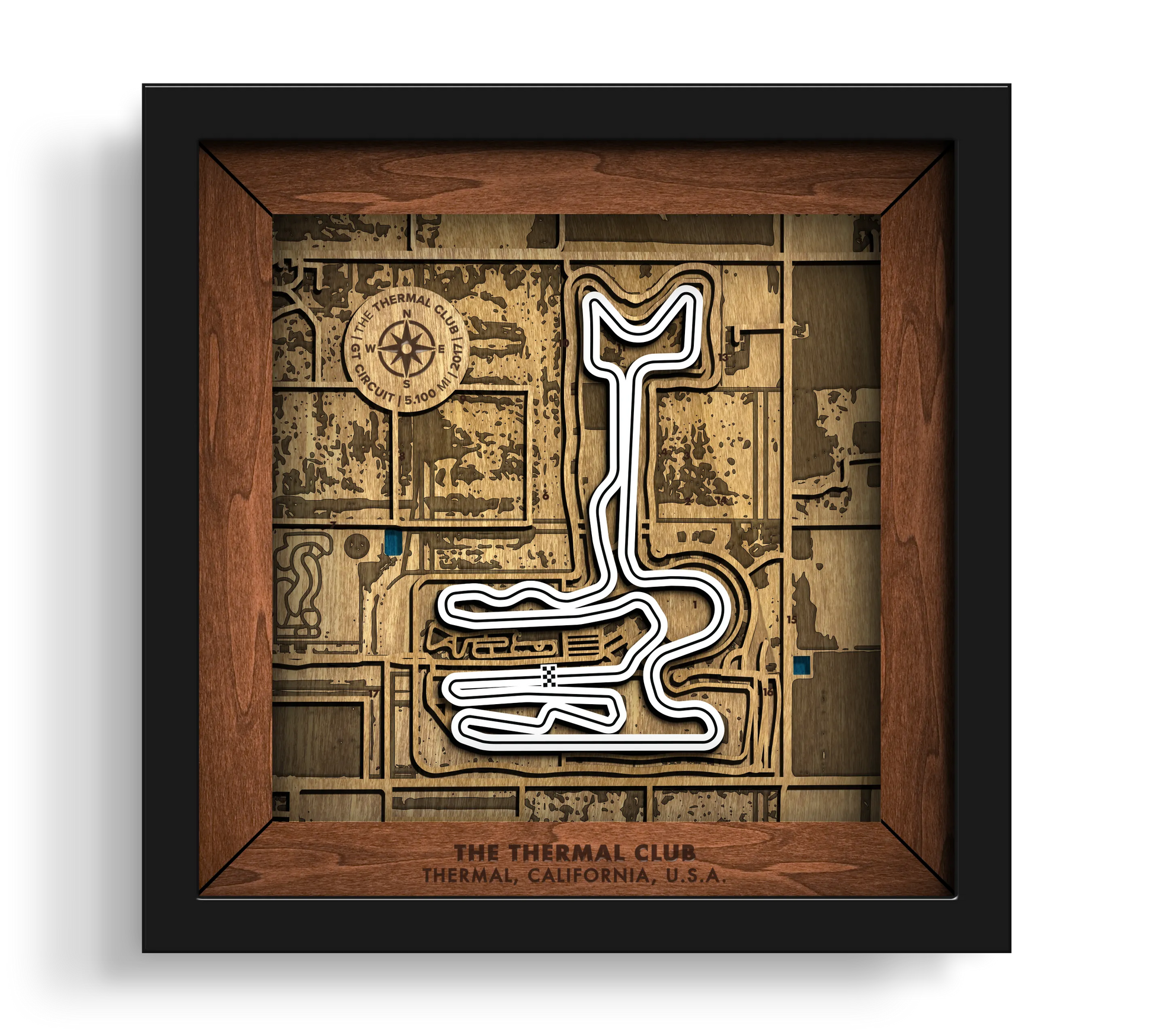 Handcrafted Thermal Club layered wooden wall art in a black frame.