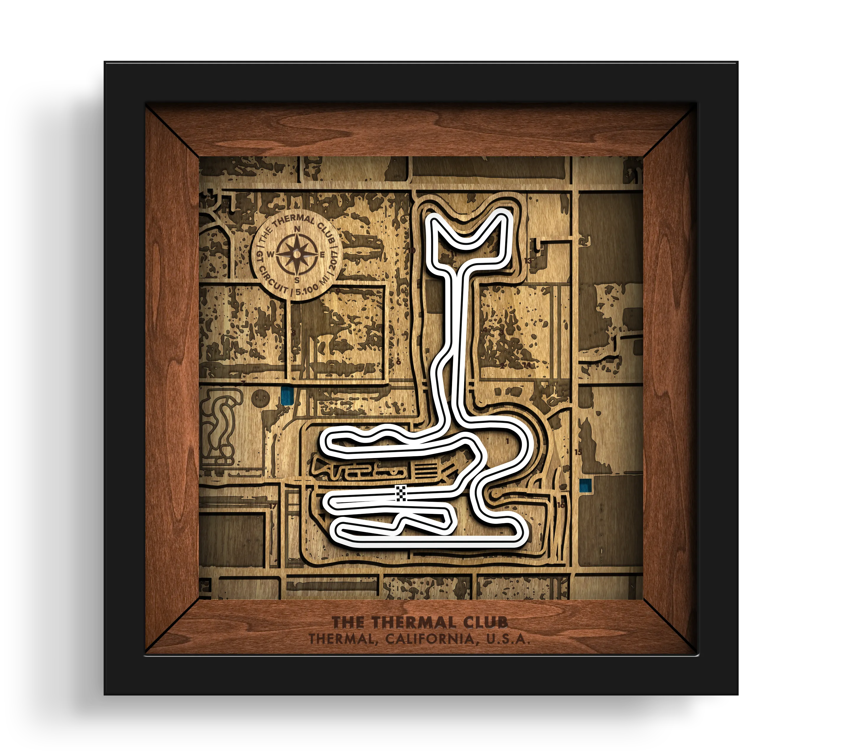 Handcrafted Thermal Club layered wooden wall art in a black frame.
