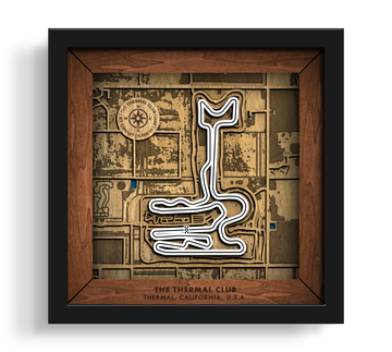 Handcrafted Thermal Club layered wooden wall art in a black frame.